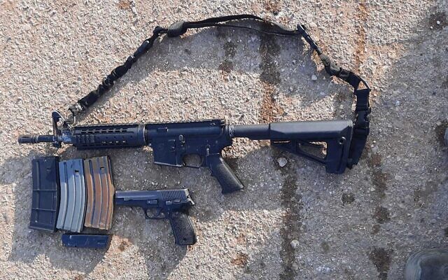 Weapons seized from Palestinian gunmen in the West Bank city of Qalqiliya, December 4, 2023. (Israel Defense Forces)