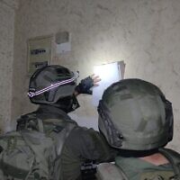 Israeli soldiers mapping out the home of Ahmed Barakat in Jenin in preparation of its demolition, Dec. 4, 2023. (IDF)