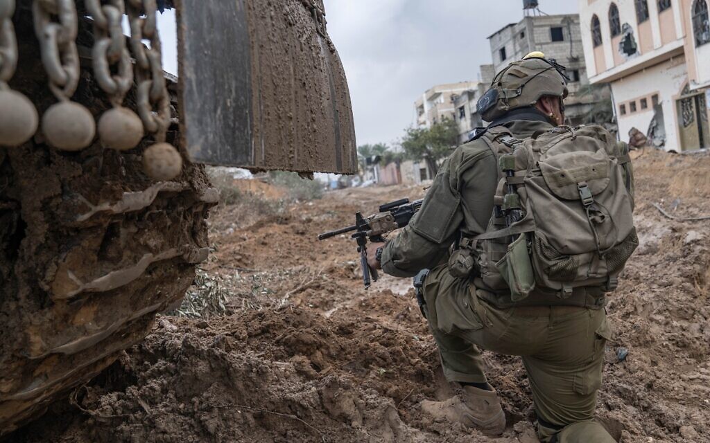 Troops of the 7th Armored Brigade operate in southern Gaza's Khan Younis, in a handout image published by the military on December 17, 2023. (Israel Defense Forces)