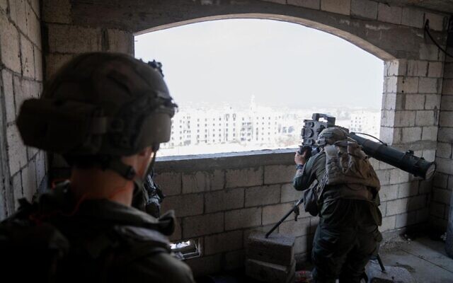 IDF forces operate in the Gaza Strip, in a handout photo released on December 26, 2023. (Israel Defense Forces)