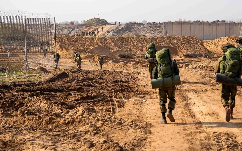 IDF troops seen operating in the Gaza Strip in this handout photo released for publication on December 10, 2023. (Israel Defense Forces)