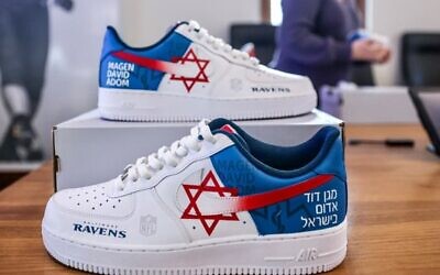 The limited edition Magen David Adom-branded Nike Air Force 1 sneakers designed by Baltimore-based artist Nathanael Elvis for a charity project the Baltimore Ravens football team supports. (Courtesy of American Friends of Magen David Adom)