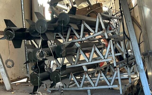 Long-range rockets found inside a truck in northern Gaza's Jabaliya, in a handout image published December 20, 2023. (Israel Defense Forces)