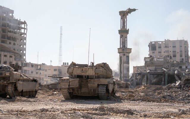 IDF tanks are seen in southern Gaza's Khan Younis, in a handout photo published December 30, 2023. (Israel Defense Forces)