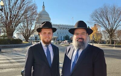 Rabbi Menachem Shemtov, left, poses with his father, Rabbi Levi Shemtov in this undated photo at the U.S. Capitol. (Art Spack)