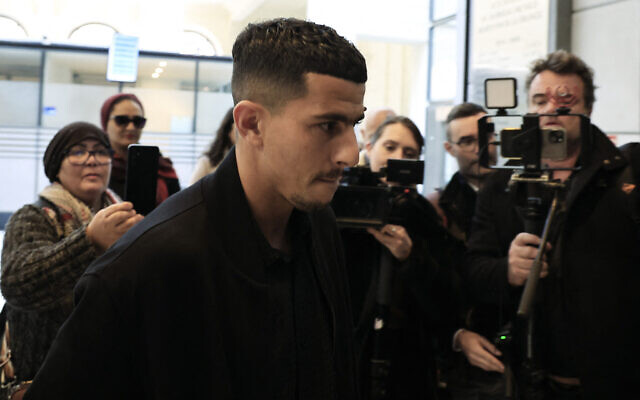 Nice's Algerian soccer player Youcef Atal arrives at Nice courthouse, southern France, for his trial for incitement to hatred, on December 18, 2023. (Valery HACHE / AFP)