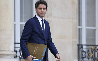 French Education and Youth Minister Gabriel Attal leaves after the weekly cabinet meeting at the presidential Elysee Palace in Paris, on December 20, 2023. (Ludovic Marin/ AFP)