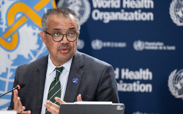 This handout photograph taken and released on December 15, 2023 by the World Health Organization (WHO), shows Director General of the World Health Organization, Tedros Adhanom Ghebreyesus delivering remarks during a press conference with press correspondents to the United Nations (ACANU) at WHO headquarters in Geneva. (Photo by Christopher BLACK / World Health Organization (WHO) / AFP)