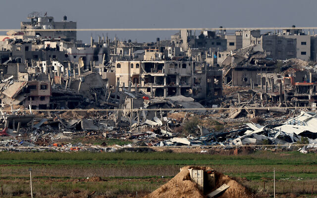 A picture taken from southern Israel shows destroyed buildings in the Gaza Strip on January 17, 2024. (JACK GUEZ / AFP)