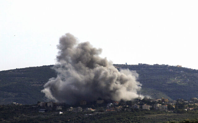 Smoke billows over the southern Lebanese village of Shihine on the border with Israel during an Israeli airstrike on January 22, 2024. (Kawnat Haju/AFP)