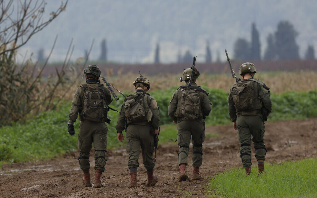 Israeli soldiers patrol an area near the northern kibbutz of Kfar Blum close to the border with Lebanon on January 25, 2024 (Jalaa Marey / AFP)