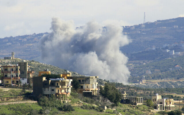 A picture taken from Lebanon's southern village of Majdelzoun shows smoke billowing during an Israeli air strike on its outskirts towards Zibqin village, on January 28, 2024 (KAWNAT HAJU / AFP)