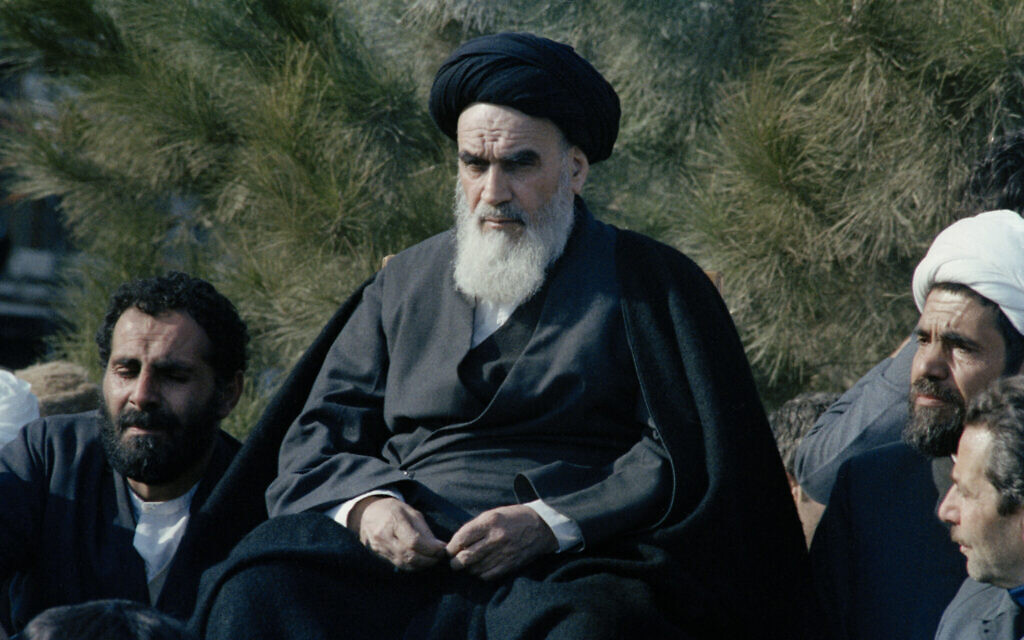 Ayatollah Ruholla Khomeini in Tehran after 14 years in exile, February 1, 1979. (AP Photo/FY)