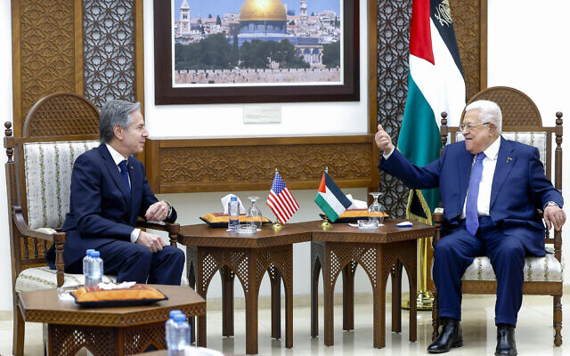 US Secretary of State Antony Blinken, left, meets with Palestinian President Mahmoud Abbas, right, in Ramallah in the West Bank, January 10, 2024. (Evelyn Hockstein/Pool Photo via AP)
