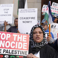 Pro-Palestinian, anti-Israel activists picket outside the High Court in Cape Town, South Africa, Jan. 11, 2024 (AP Photo/Nardus Engelbrecht)