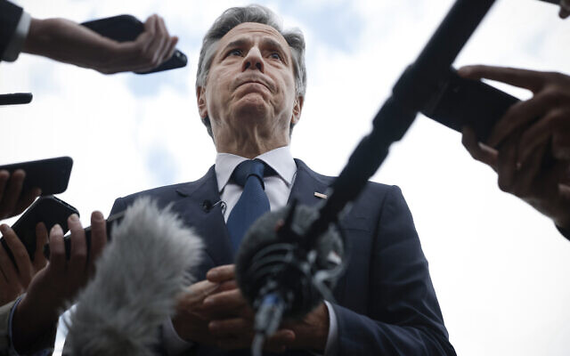 US Secretary of State Antony Blinken speaks to members of the media before boarding his plane to return to Washington, following his week-long trip aimed at calming tensions across the Middle East, in Cairo, Egypt, January 11, 2024. (Evelyn Hockstein/Pool via AP)