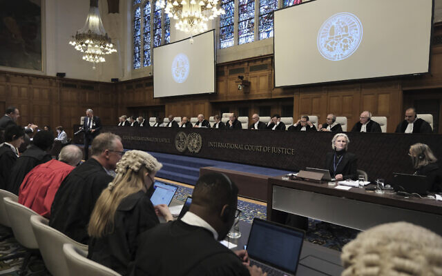 Judges and parties sit during a hearing at the International Court of Justice in The Hague, Netherlands, Jan. 12, 2024. (AP Photo/Patrick Post)