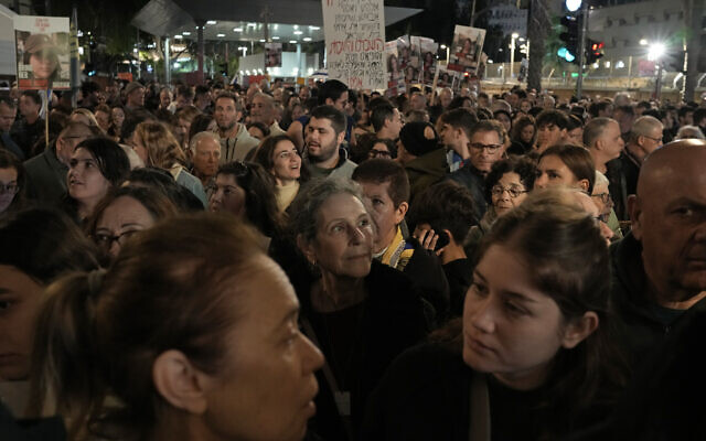 People attends a demonstration calling for the release of the hostages taken by Hamas terrorists into the Gaza Strip, at the Hostages Square in Tel Aviv, Israel, Saturday Jan. 13, 2024. (AP Photo/Leo Correa)