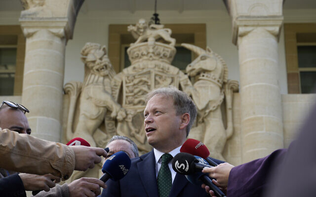 Britain's Defense Secretary Grant Shapps talks to the media after a meeting with the Cyprus' president Nikos Christodoulides at the Presidential palace in capital Nicosia, Cyprus, Jan. 19, 2024. (AP Photo/Petros Karadjias)