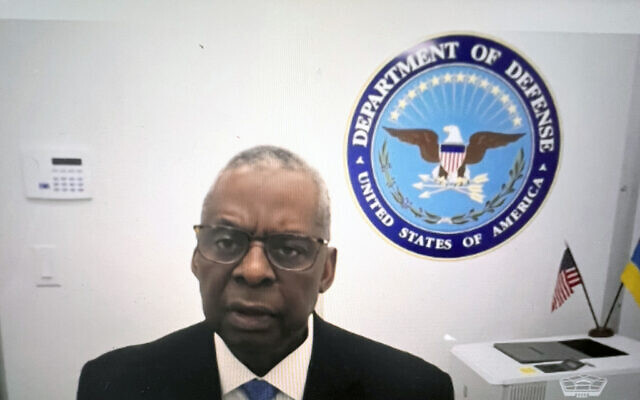 Screen capture from video of Defense Secretary Lloyd Austin provides opening remarks at the Ukraine Defense Contact Group, January 23, 2024 from his home in Great Falls, Virginia. (US Department of Defense via AP)