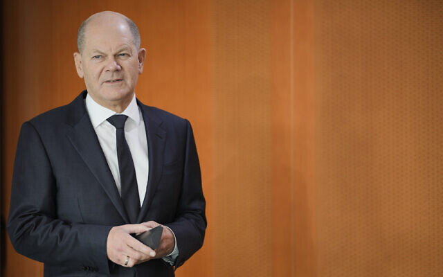 German Chancellor Olaf Scholz arrives for the cabinet meeting of the German government at the chancellery in Berlin, Germany, Wednesday, Jan. 24, 2024. (AP/Markus Schreiber)