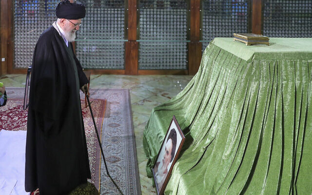 Supreme Leader Ayatollah Ali Khamenei prays at the grave of the late revolutionary founder Ayatollah Khomeini, just outside Tehran, Iran, January 31, 2024. (Office of the Iranian Supreme Leader via AP)