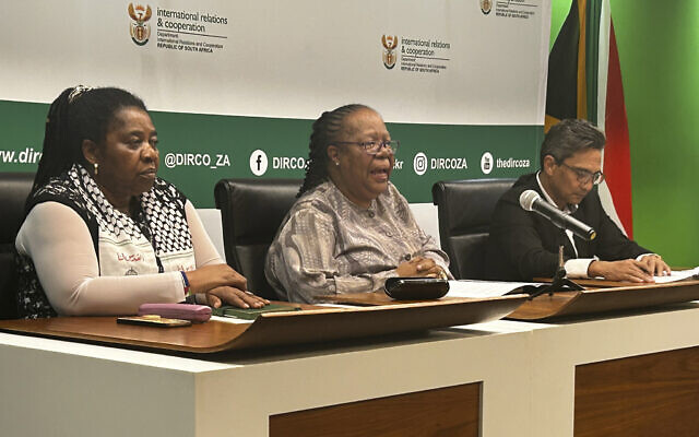 South African Foreign Minister Naledi Pandor, center, adresses a news conference in Pretoria, South Africa, Wednesday, Jan. 31, 2024. (AP Photo/Sebabatso Mosamo)
