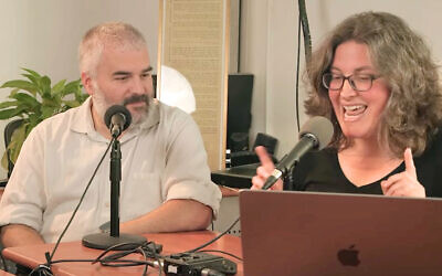 Times of Israel's senior analyst Haviv Rettig Gur (left) and deputy editor Amanda Borschel-Dan record a podcast in ToI's Jerusalem office, January 2024. (Eli Katzoff)