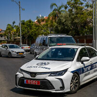 Illustrative: A police car in Rishon Lezion on July 3, 2022. (Yossi Aloni/Flash90)