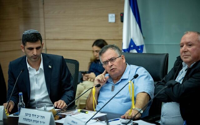 Likud members (L-R) Shlomo Karhi, David Bitan and David Amsalem attend a committee meeting at the Knesset on November 20, 2023. (Yonatan Sindel/Flash90)