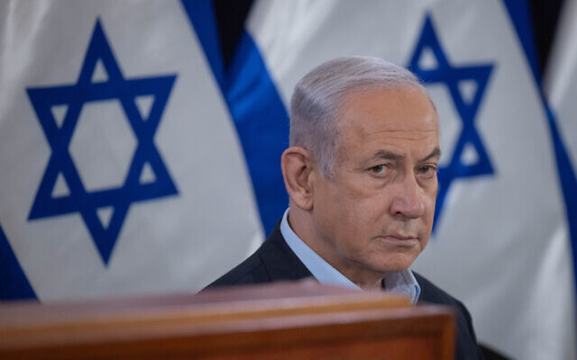 Prime Minister Benjamin Netanyahu attends a press conference at the Ministry of Defense, in Tel Aviv. November 22, 2023. (Chaim Goldberg/Flash90)