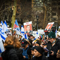 Demonstrators gather for a rally calling for the release of Israeli hostages held by Hamas terrorists in the Gaza Strip, outside of United Nations headquarters in New York City, on December 12, 2024. (Arie Leib Abrams/Flash90)