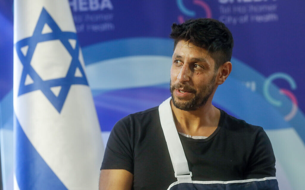 Israeli singer-songwriter, actor and reserve soldier Idan Amedi who was seriously injured while fighting in the Gaza Strip speaks at a press conference upon his discharge from Sheba Medical Center, Ramat Gan, January 25, 2024. (Miriam Alster/Flash90)