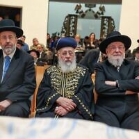 Chief Ashkenazi Rabbi David Lau, left, attends a Chief Rabbinate Council meeting with his Sephardic counterpart Rabbi Yitzhak Yosef and David Lau's father and predecessor Meir Lau, in Jerusalem on December 24, 2023. (Courtesy of the Chief Rabbinate)