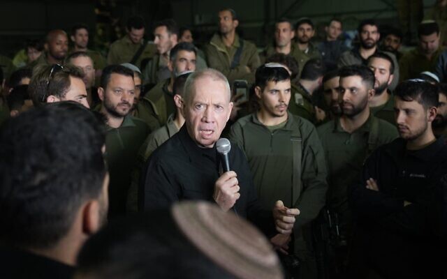 Defense Minister Yoav Gallant speaks to reserve troops of the IDF's 11th Brigade, January 28, 2024. (Elad Malka)