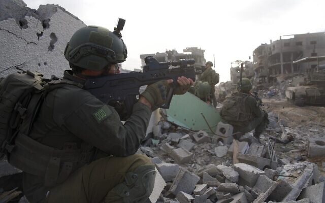 IDF soldiers operating in the Gaza Strip in an undated photo released January 2, 2024. (Israel Defense Forces)
