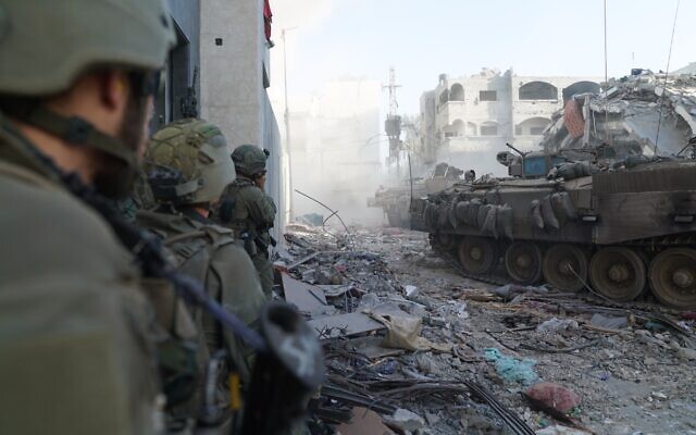 IDF troops operate in the Gaza Strip in a handout image published January 16, 2024. (Israel Defense Forces)