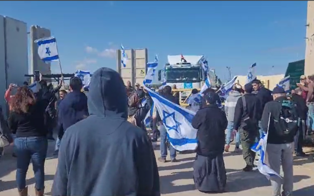 Israelis demonstrate at a protest action at Kerem Shalom border crossing on January 24, 2024. (Courtesy Reut Ben Haim)