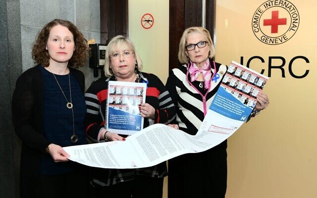 From right to left: National President of HWZOA Carol Ann Schwartz, immediate past National President Rhoda Smolow, and Executive Director of Hadassah Offices in Israel Suzanne Patt Benvenisti had over a petition calliong on the Red Cros to do more to help the hostages in Gaza  (HWZOA/Avi Hayun)