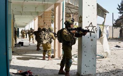IDF troops operate in the Gaza Strip in a photo cleared for publication on February 25, 2024. (IDF)