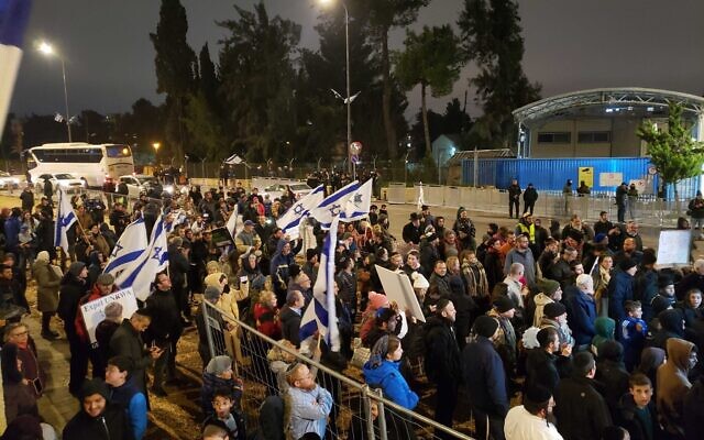 Israelis protest outside the UNRWA headquarters in East Jerusalem on February 5, 2024. (Eli Katzoff/ Times of Israel)
