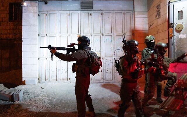 Illustrative: IDF troops operate in the West Bank, early February 19, 2024. (Israel Defense Forces)