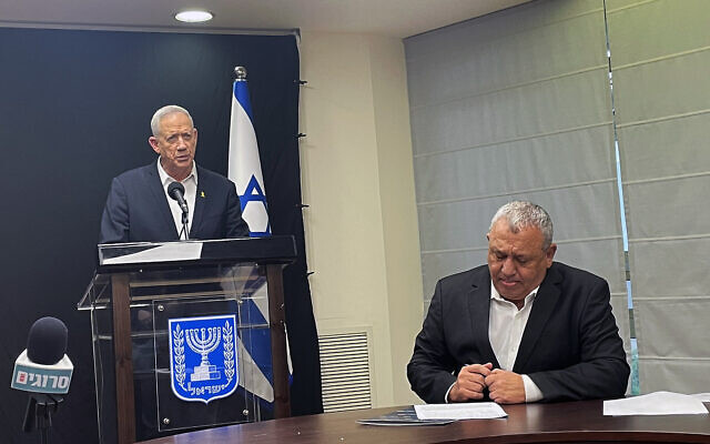 Ministers Benny Gantz (L) and Gadi Eisenkot present an outline for the draft of Arabs and ultra-Orthodox Jews into the Israeli army during a press conference in the Knesset, February 26, 2024. (Sam Sokol)