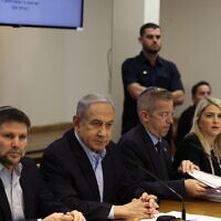 Illustrative: Prime Minister Benjamin Netanyahu (2-L) heads the weekly cabinet meeting at the Defense Ministry in Tel Aviv on January 7, 2024. (RONEN ZVULUN / POOL / AFP)