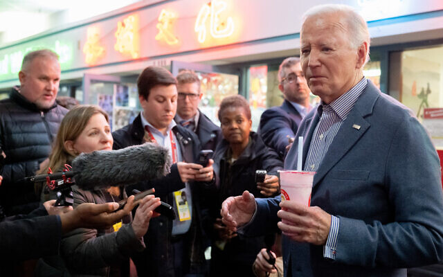 US President Joe Biden speaks with reporters while visiting the No. 1 Boba Tea shop in Las Vegas, Nevada, February 5, 2024. (Saul Loeb/AFP)