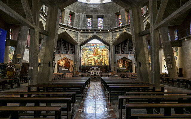 This picture taken on January 31, 2024 shows a view of the almost empty Roman Catholic Basilica of the Annunciation in Nazareth in northern Israel. Nazareth's landmark basilica is empty, the surrounding restaurants, stores and market that thrive on pilgrims are closed, while hotels in the Old City have been shut for months. (Nicolas Garcia/AFP)