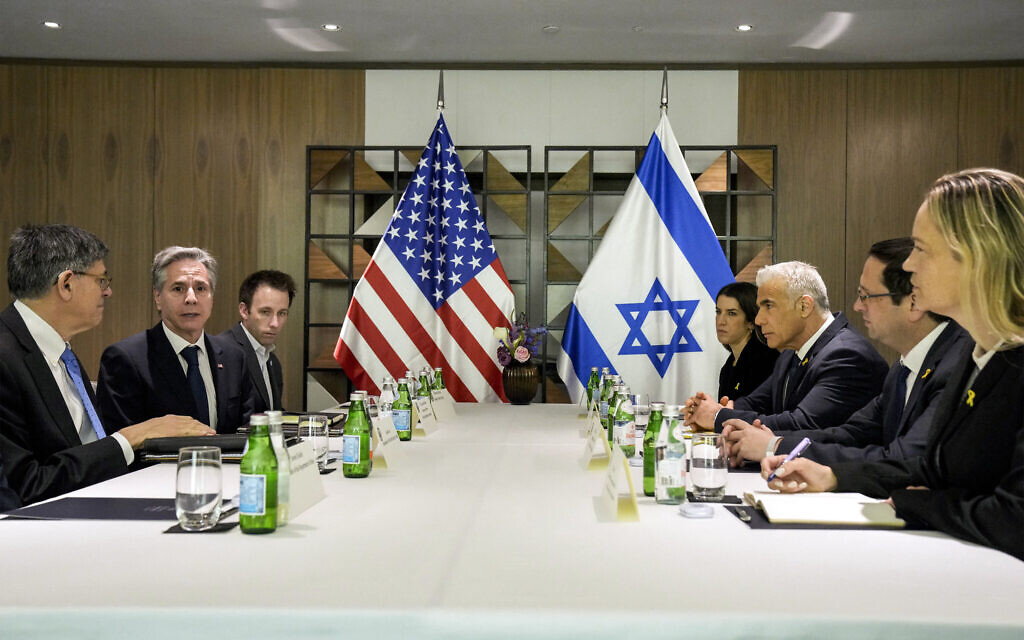 US Secretary of State Antony Blinken (2nd-L), accompanied by deputy chief of staff Tom Sullivan (3rd-L) and US Ambassador to Israel Jacob Lew (L), meets with Israeli opposition leader Yair Lapid (3rd-R), in Tel Aviv on February 8, 2024. (Mark Schiefelbein / AFP)