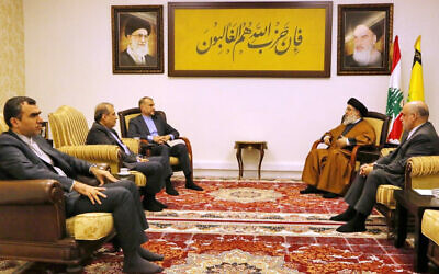 This handout picture provided by Hezbollah's media office on February 10, 2024 shows Lebanese Shiite terror group's leader, Hassan Nasrallah, meeting with Iranian Foreign Minister Hossein Amir-Abdollahian at an undisclosed location in Lebanon. (Photo by Hezbollah's Media Office / AFP)