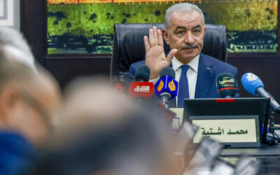 Palestinian Authority Prime Minister Mohammad Shtayyeh chairs a cabinet meeting in Ramallah on February 20, 2024. (Jaafar ASHTIYEH / AFP)