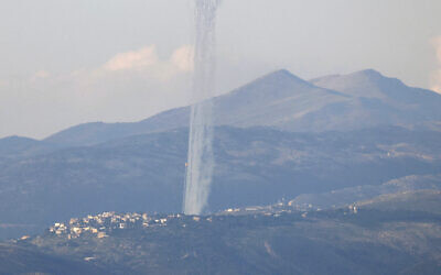 This picture taken from an Israeli position along the border with southern Lebanon shows rockets fired from Lebanon into Israel on February 26, 2024. (Photo by Jalaa MAREY / AFP)